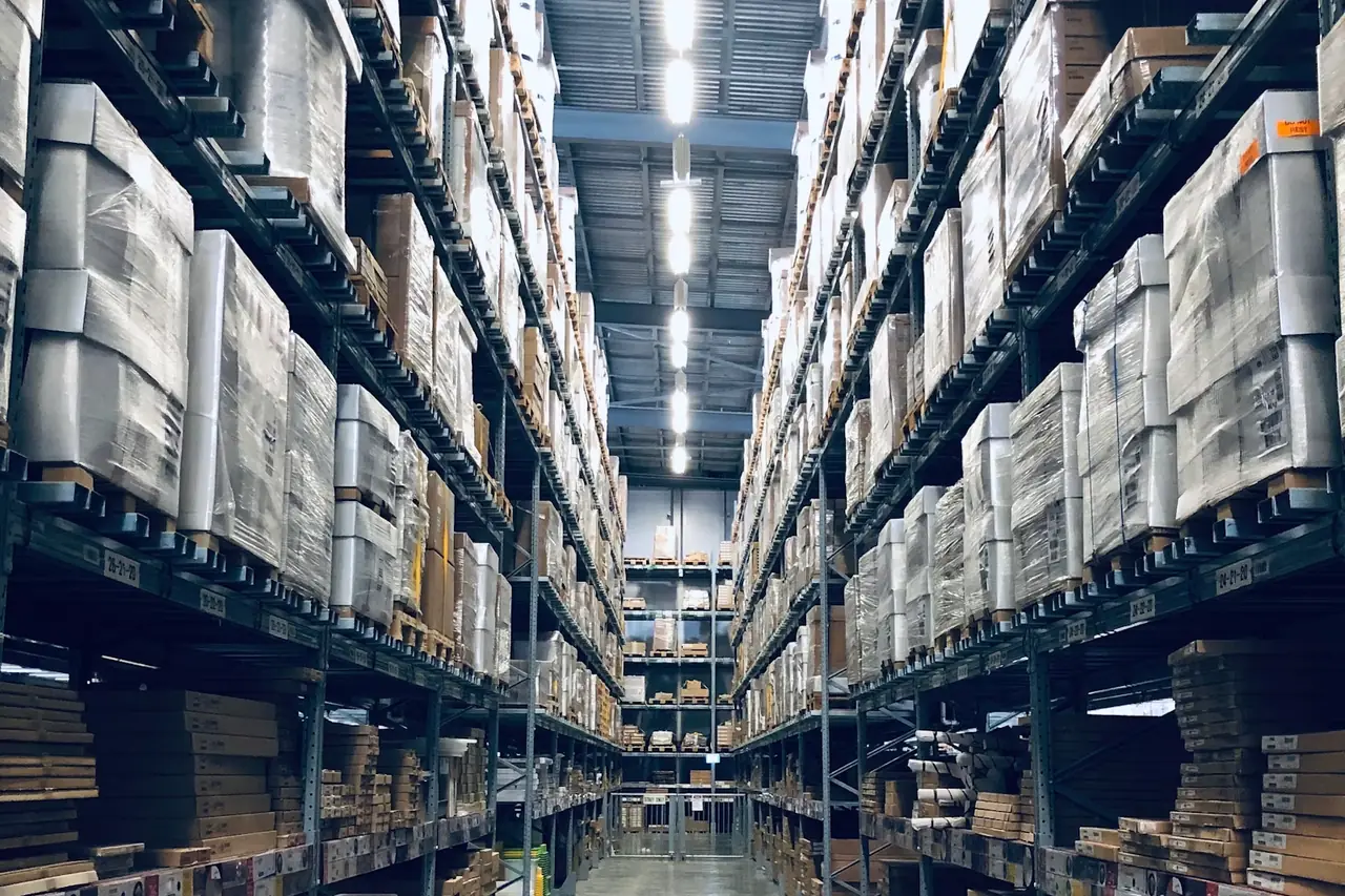 Warehouse aisle with labeled bins
